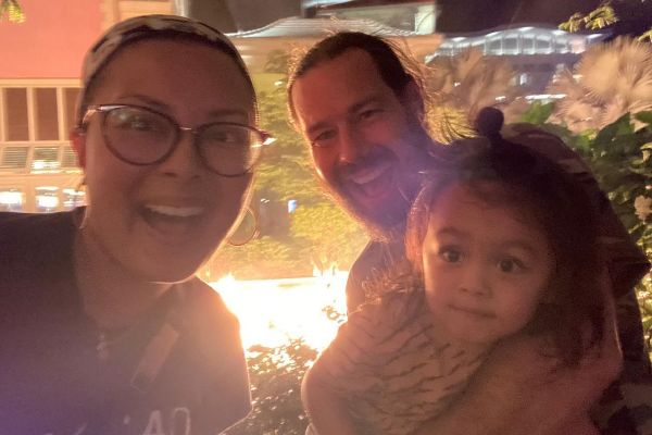 Photo of Chris Pontius along with his wife and children. 